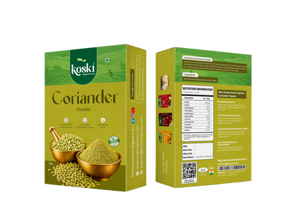 Two boxes of Koski organics Coriander Powder shown on a plain white background, with one front-facing box and one side/back-facing box displaying product details, nutrition facts, QR code, and ingredient imagery.