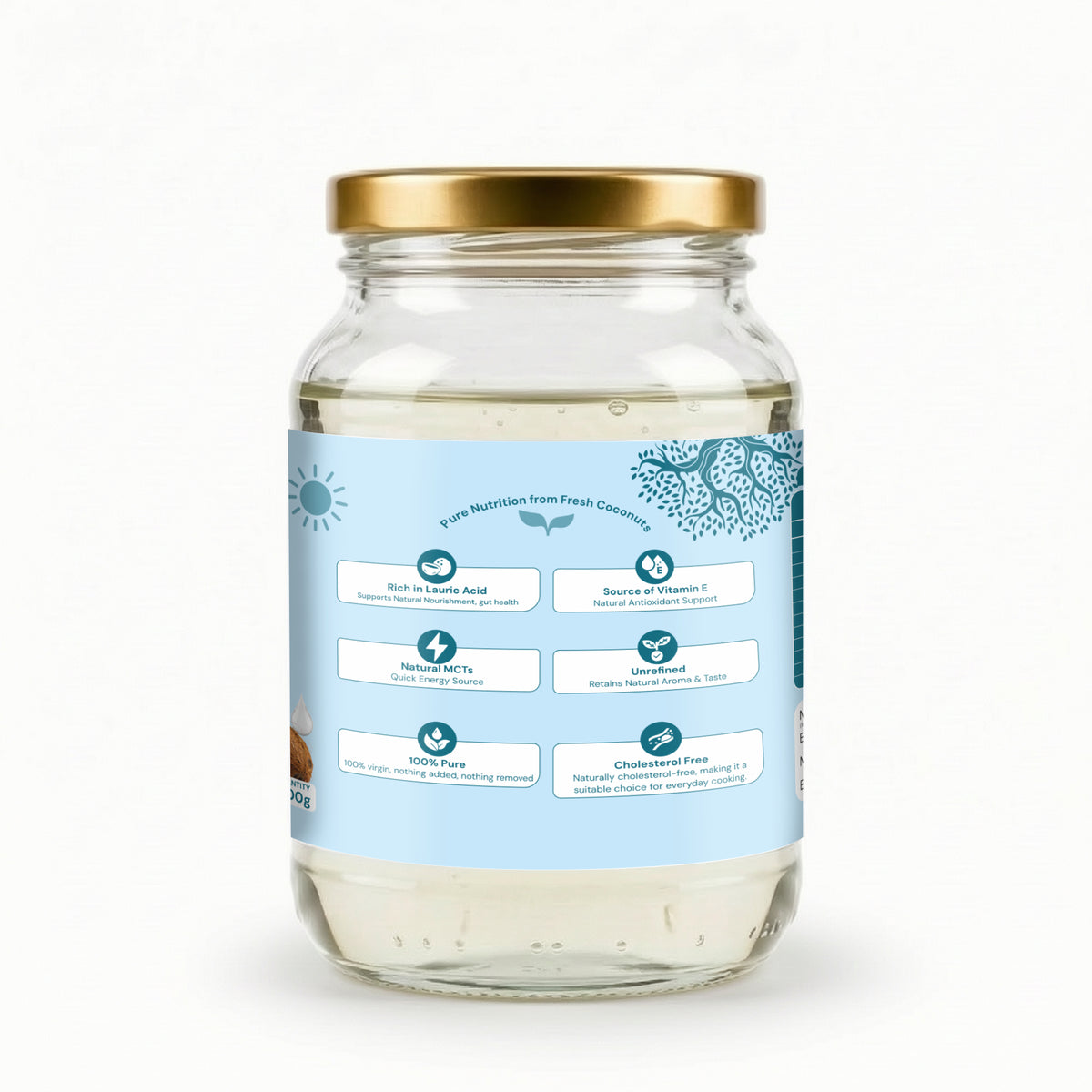 A clear glass jar of coconut oil with a gold metal lid and a light blue label showing product benefits, set against a plain white background.