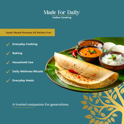 Promotional graphic for Koski Wood-Pressed Oil, featuring a plated Indian breakfast with dosa, rice, and chutney on a teal background with text highlighting its suitability for daily cooking, baking, and household use.