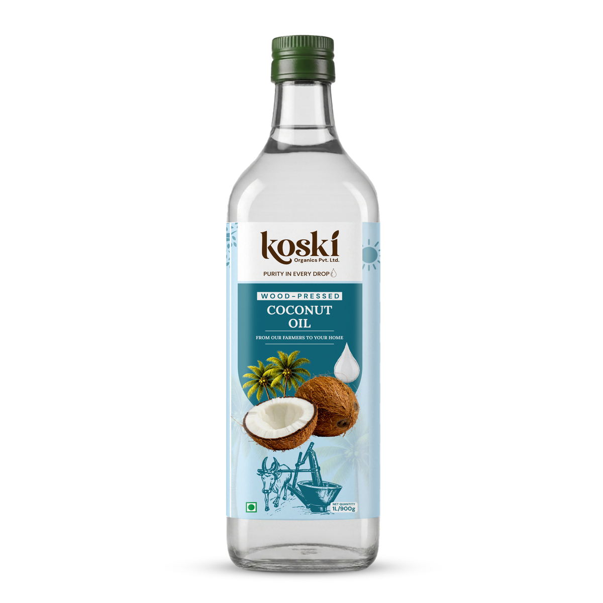 A bottle of Koski WoodPressed Coconut Oil on a clean white background. The clear glass bottle features a green screw cap and a light blue label with illustrations of a coconut, green leaves, and a traditional coconut oil grinder