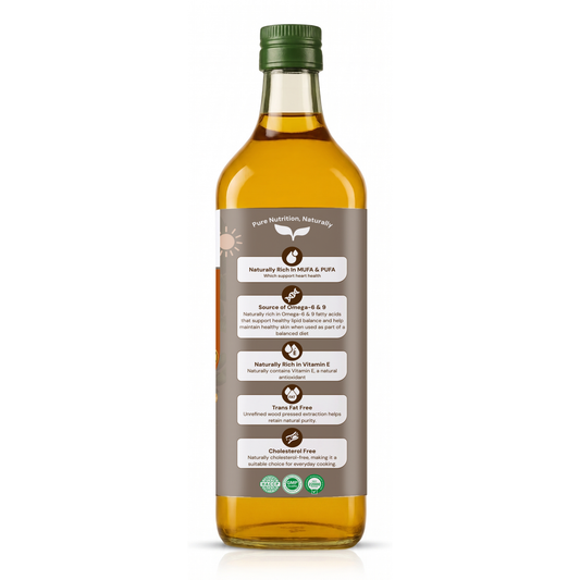 A bottle of golden yellow olive oil with a green cap and a brown label detailing product benefits, shown on a white background.