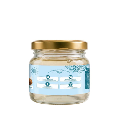 A glass jar of coconut oil with a gold metal lid and a light blue label, set against a clean white background.

Details