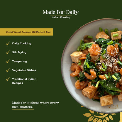 Promotional graphic for Koski Wood-Pressed Oil, featuring a bowl of prepared Indian food on the right and text listing use cases like daily cooking, stir frying, tempering, and vegetable dishes on the left, set against a dark green background.