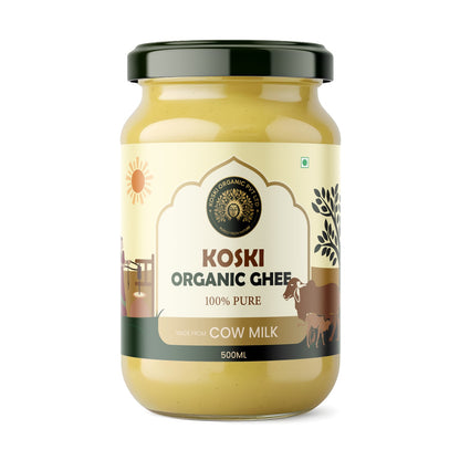 A 500ml glass jar of Koski Organics Ghee on a clean white background. The jar contains pale yellow ghee and is sealed with a dark green lid.

Details