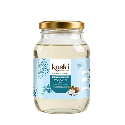 A 500ml glass jar of Kosái Coconut Oil with a gold metal lid and a light blue label, shown on a clean white background.