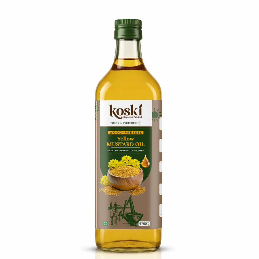 A 1-liter glass bottle of Koski Wood-Friendly Yellow Mustard Oil with a green cap and a brown and green label, set against a plain white background