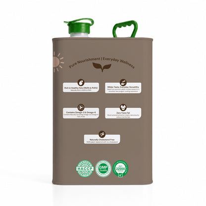 A matte taupe-brown metal canister of Pure Nourishment Everyday Wellness oil with green cap and handle, featuring product details and certification logos on the front, set against a plain white background.