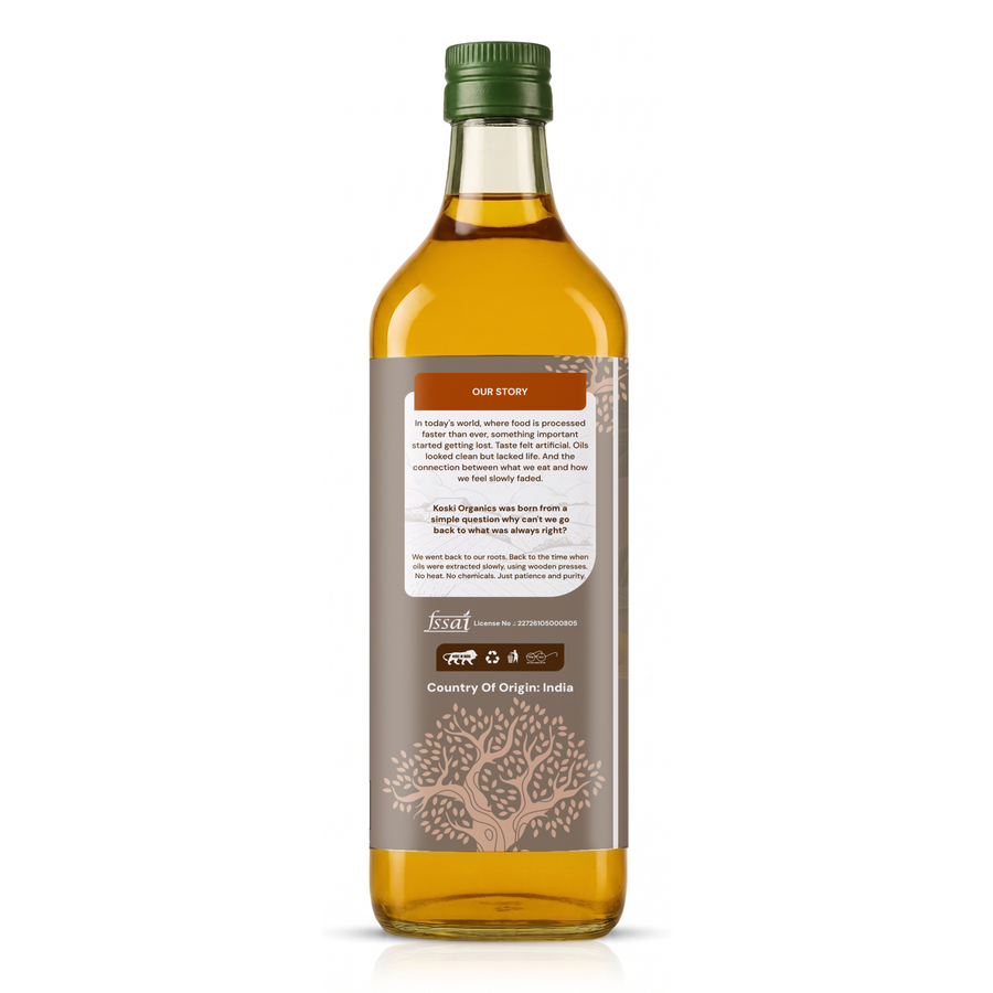 A glass bottle of golden yellow oil with a dark green cap and a brown label, shown from the back on a white background.