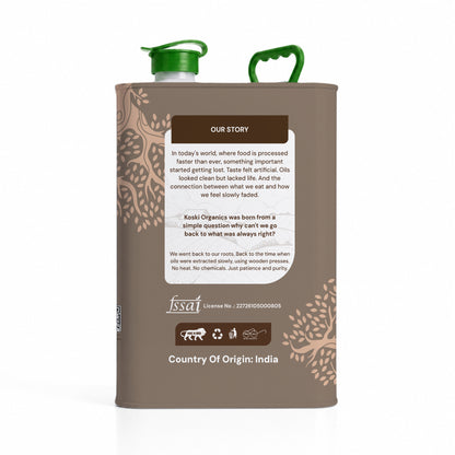 A tall rectangular canister of Koali Organics Coconut Oil with a brown body, green flip-top lid, and green handle, shown on a white background with a soft shadow.