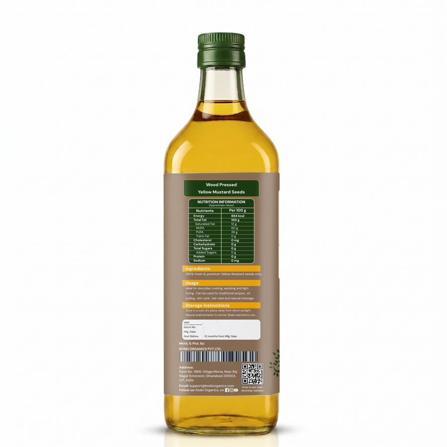 Back view of a 500ml glass bottle of Yellow Muskmel Oil with a brown label showing nutritional facts and ingredients, topped with a green cap, on a white background.